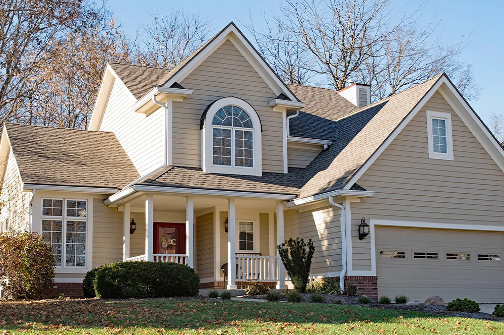 Home with Vinyl Siding DM Roofing HP